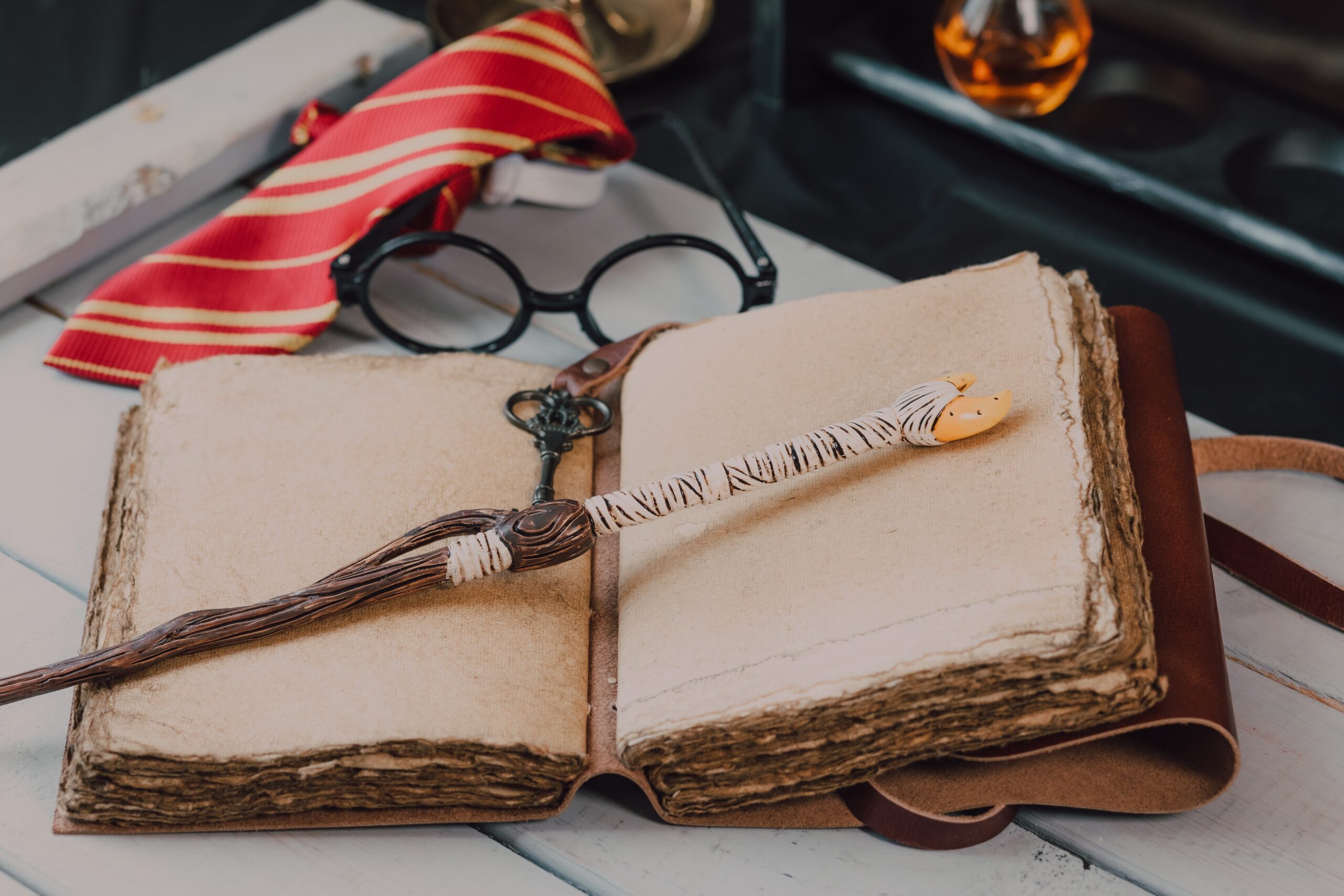 Photo by RODNAE Productions: https://www.pexels.com/photo/close-up-shot-of-a-wand-beside-a-spell-book-7978986/