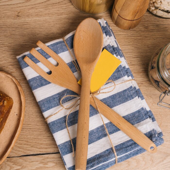 Photo by Tima Miroshnichenko: https://www.pexels.com/photo/brown-wooden-spoon-and-fork-on-blue-and-white-kitchen-towel-4805235/